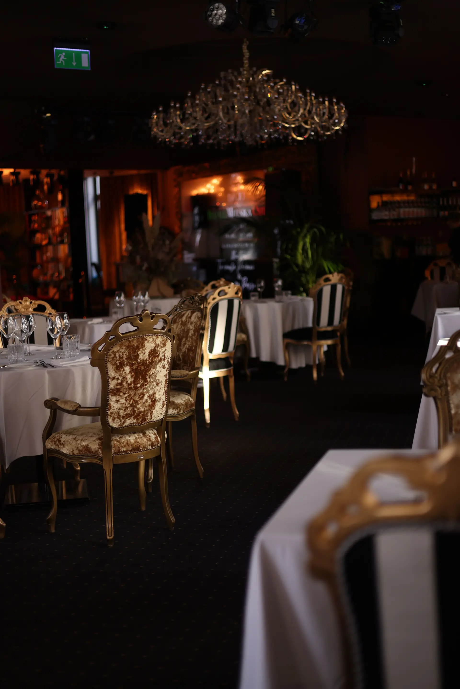 Elegant BellorafineHall dining room with luxury chandeliers